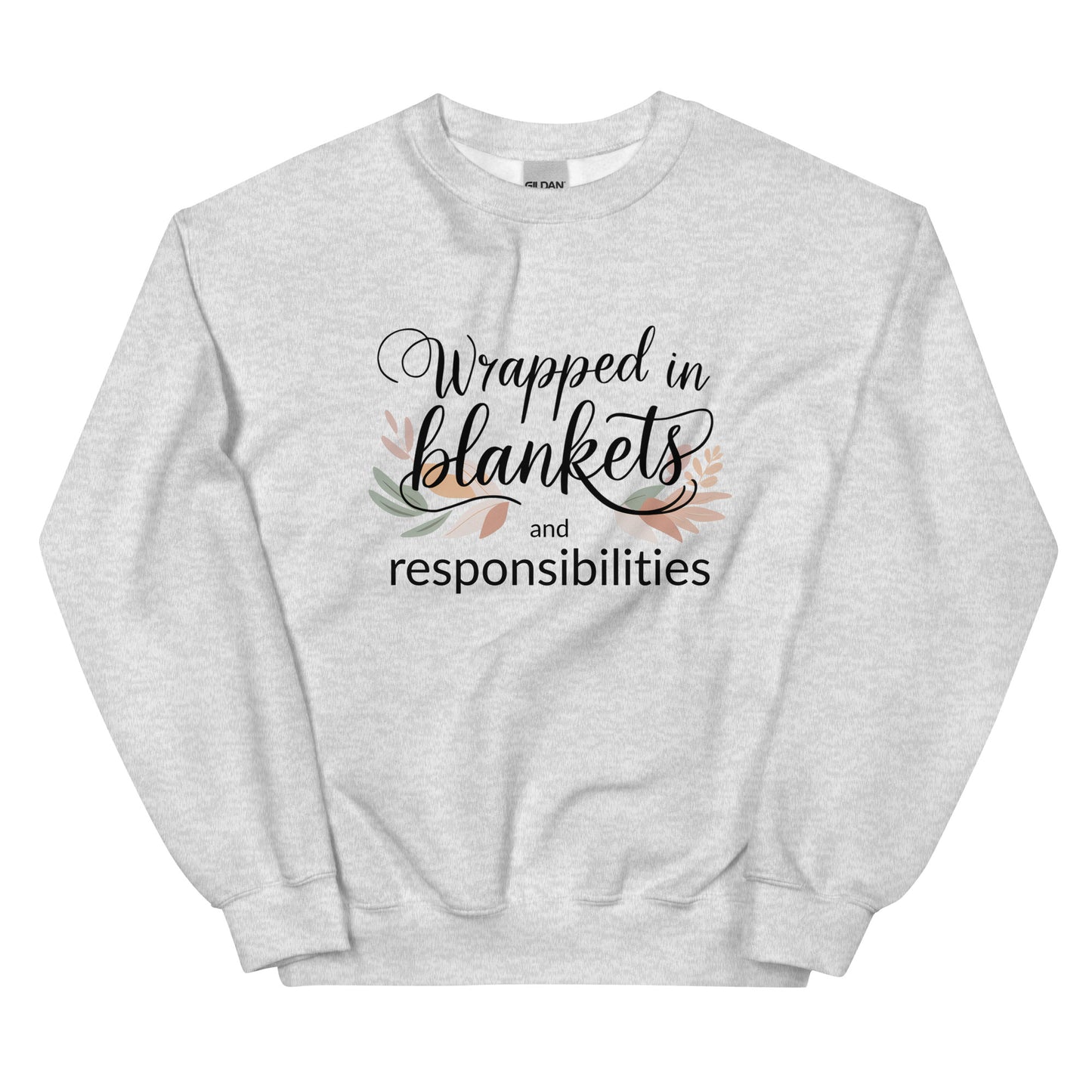 Gray sweatshirt with text 'Wrapped in blankets and responsibilities' on a white background