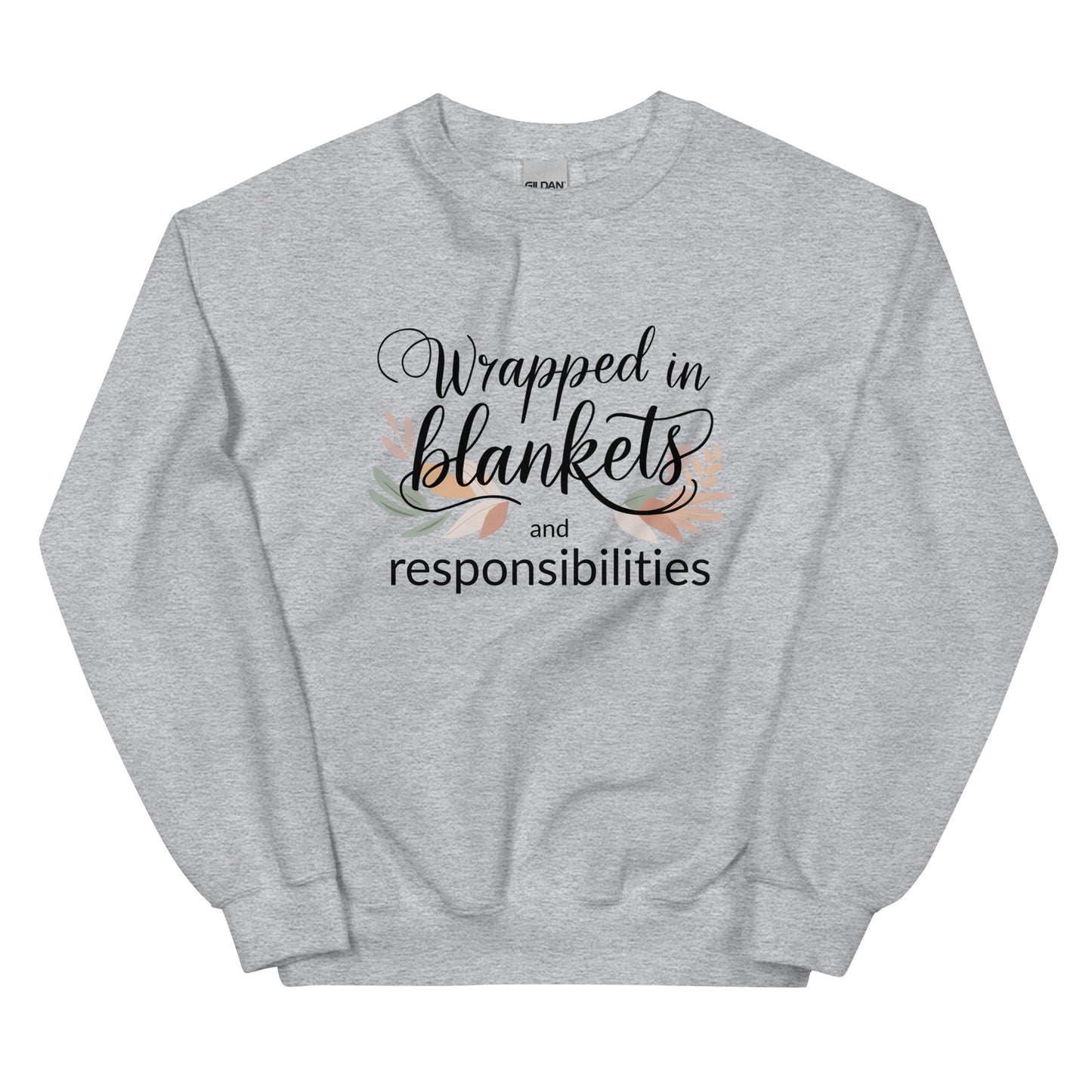 Gray sweatshirt with text 'Wrapped in blankets and responsibilities' on a white background