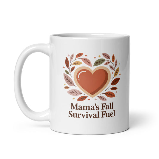 White mug with a heart design and text 'Mama's Fall Survival Fuel' on a white background