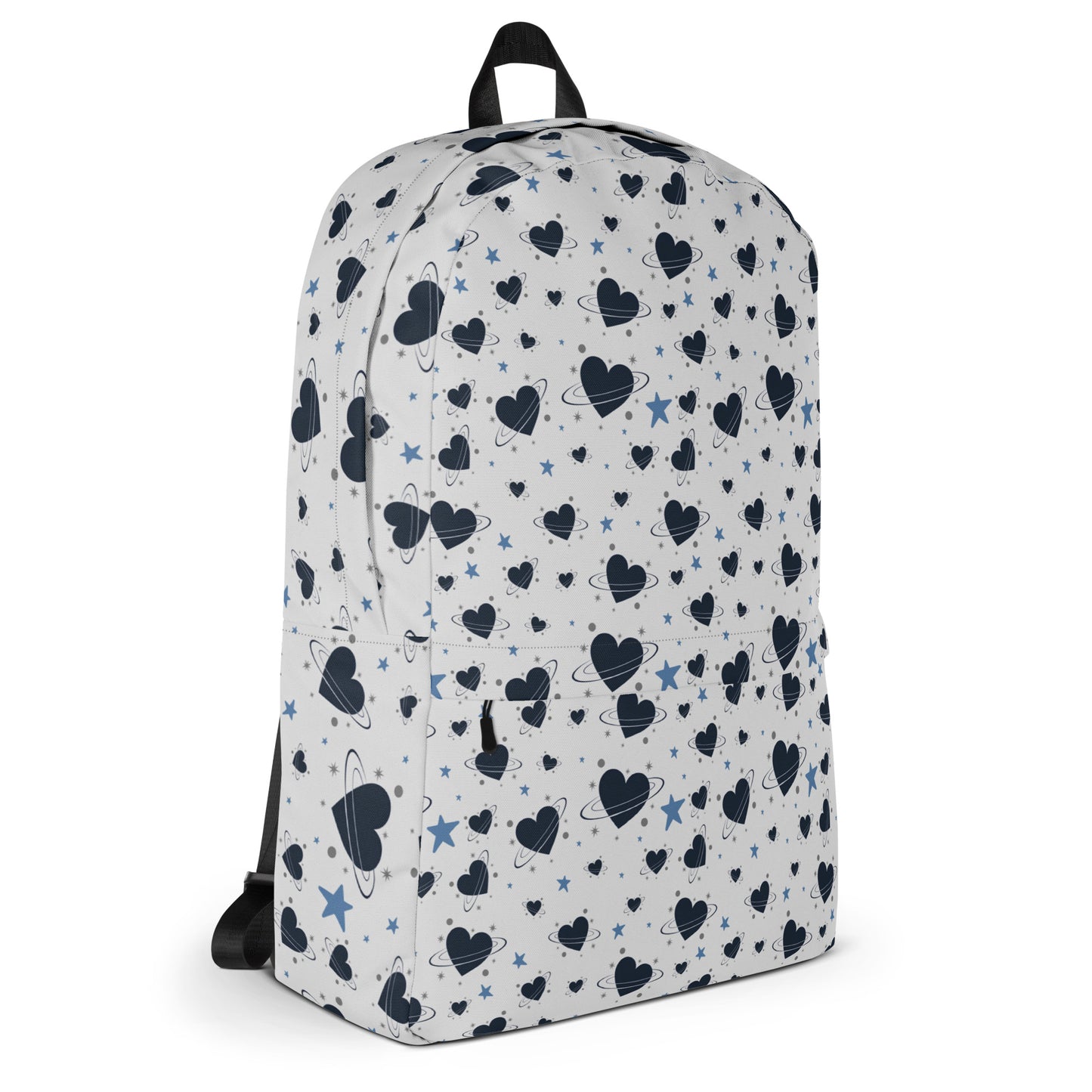 White backpack with all-over navy heart and star pattern, front pocket and visible inside pocket label
