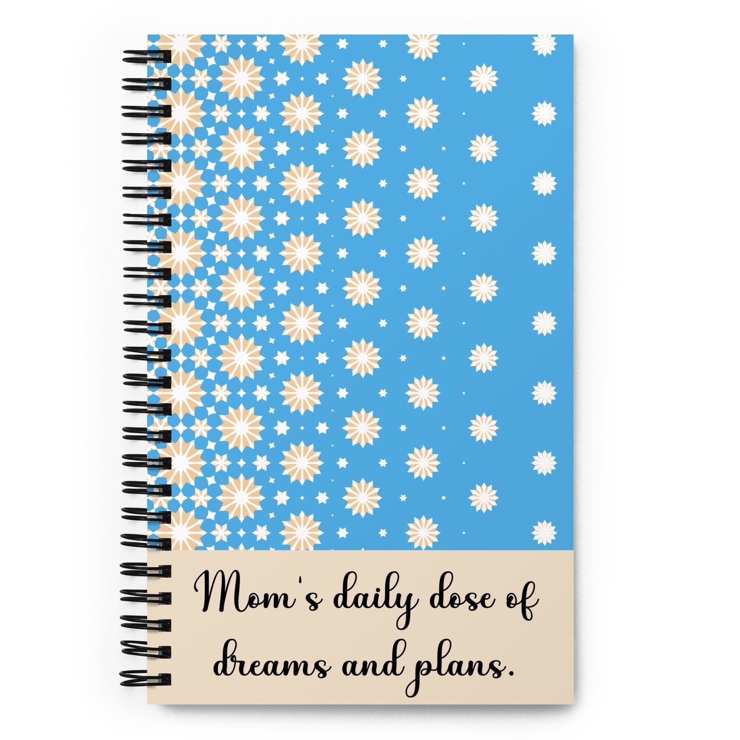 Blue spiral notebook with yellow and white stars design and “Mom’s daily dose of dreams and plans” quote - front cover