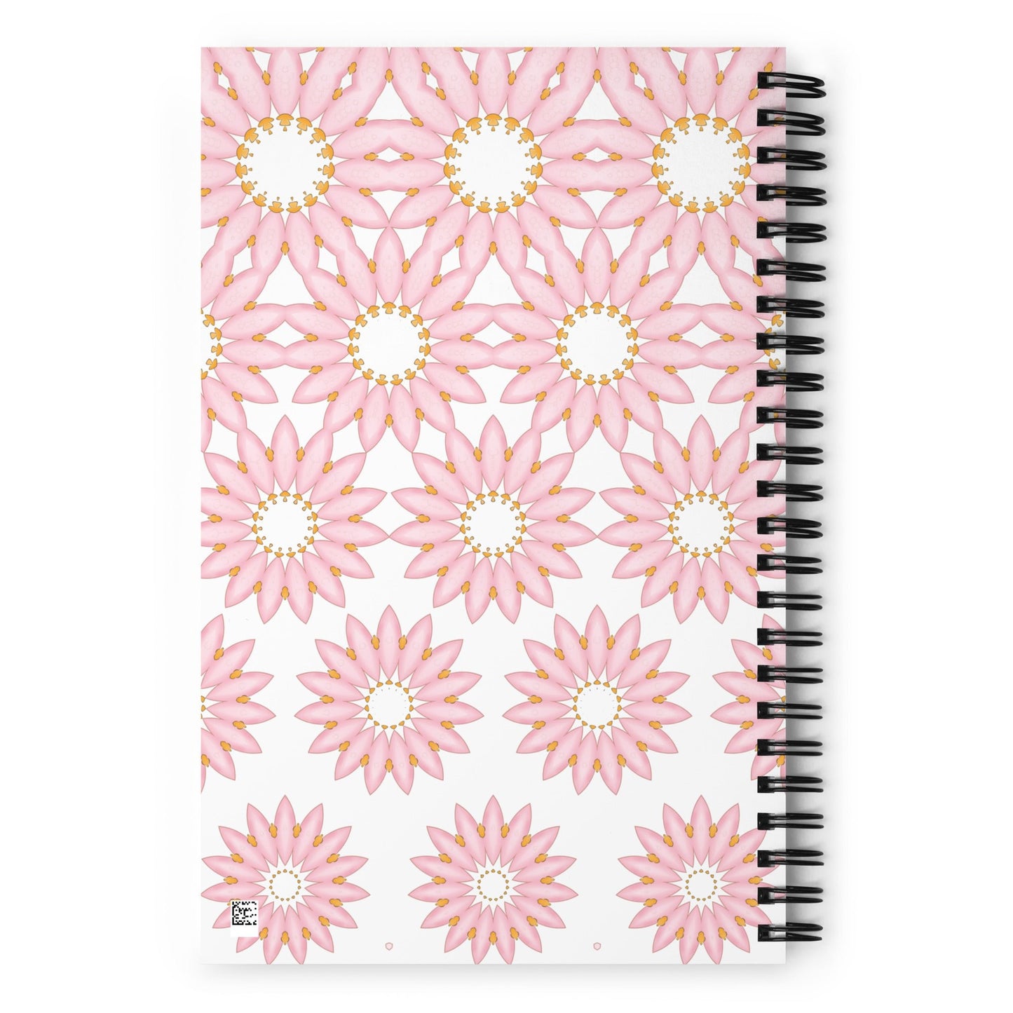Back view of spiral notebook with pastel pink floral pattern – matching the “Let your dreams blossom” front design