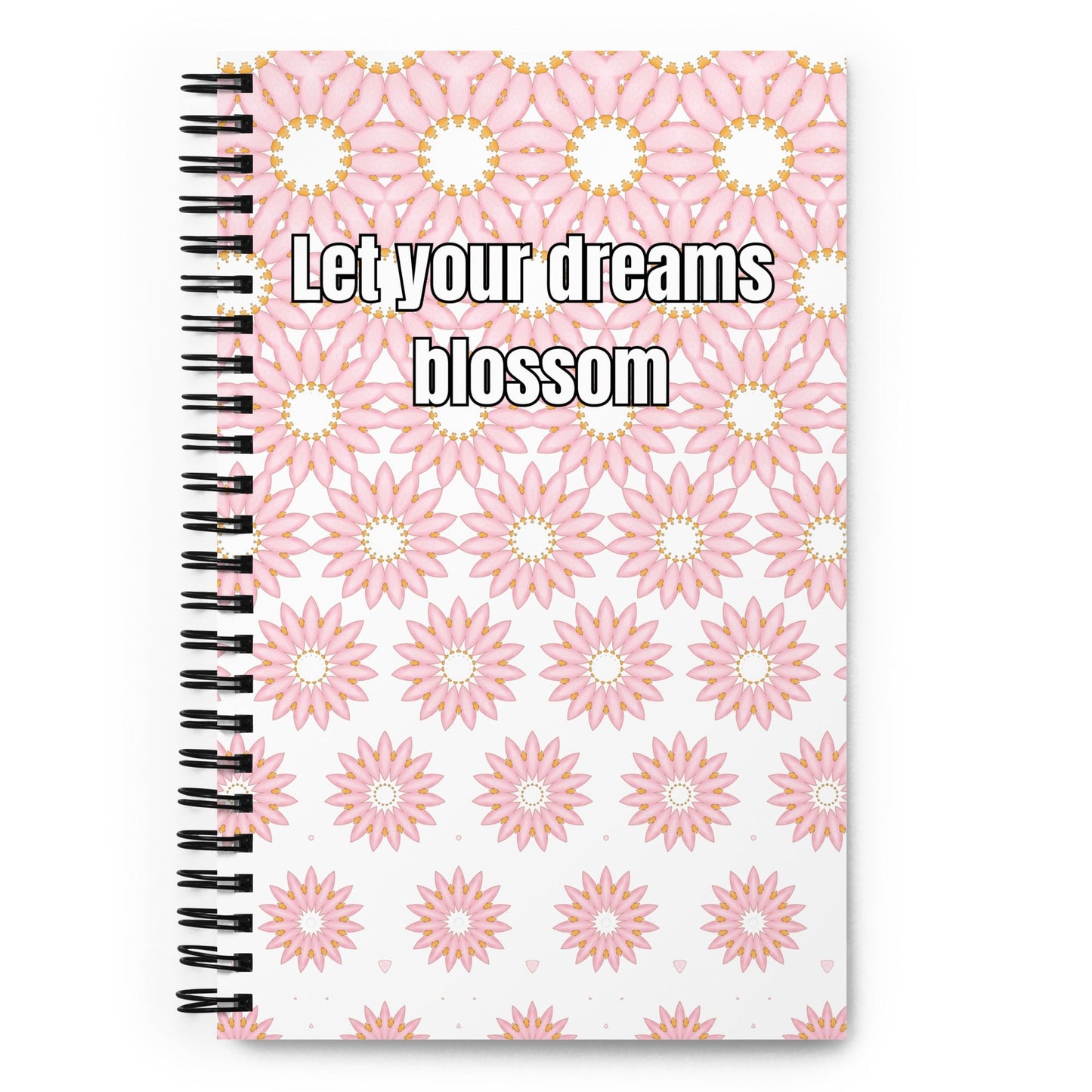 Spiral notebook with “Let your dreams blossom” quote on pink floral cover - white background