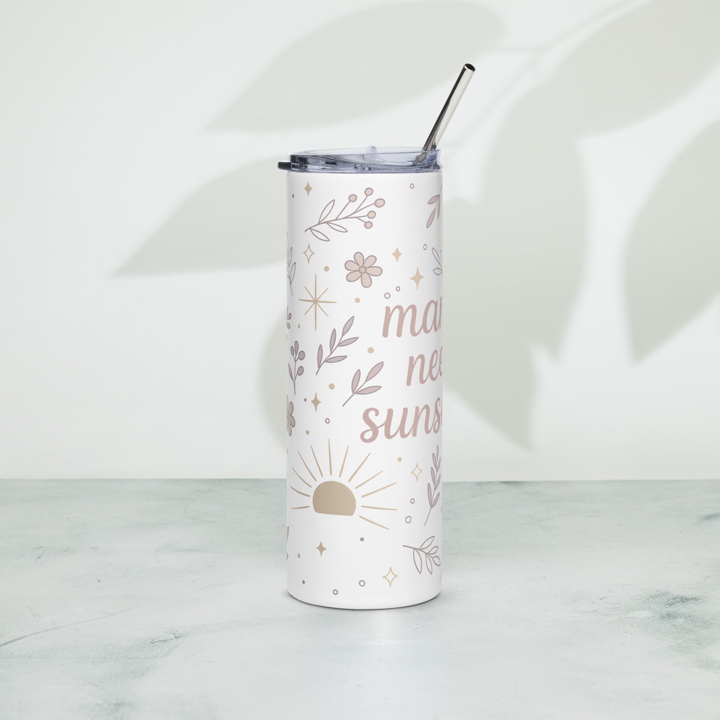 Front view of stainless steel summer tumbler with pastel floral design and “Mama Needs Sunshine” quote on white background