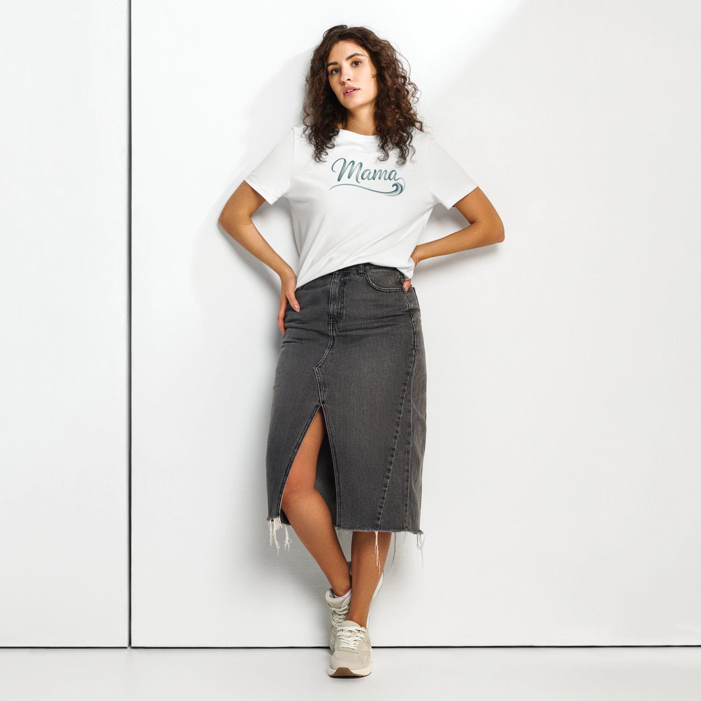 Woman wearing white Ocean Mama t-shirt with wave design, styled casually for summer look, part of Happily Styled collection