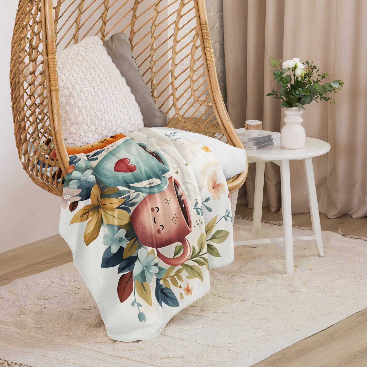 Sherpa blanket featuring smiling coffee cup illustrations and floral pattern draped over a rattan chair - large size