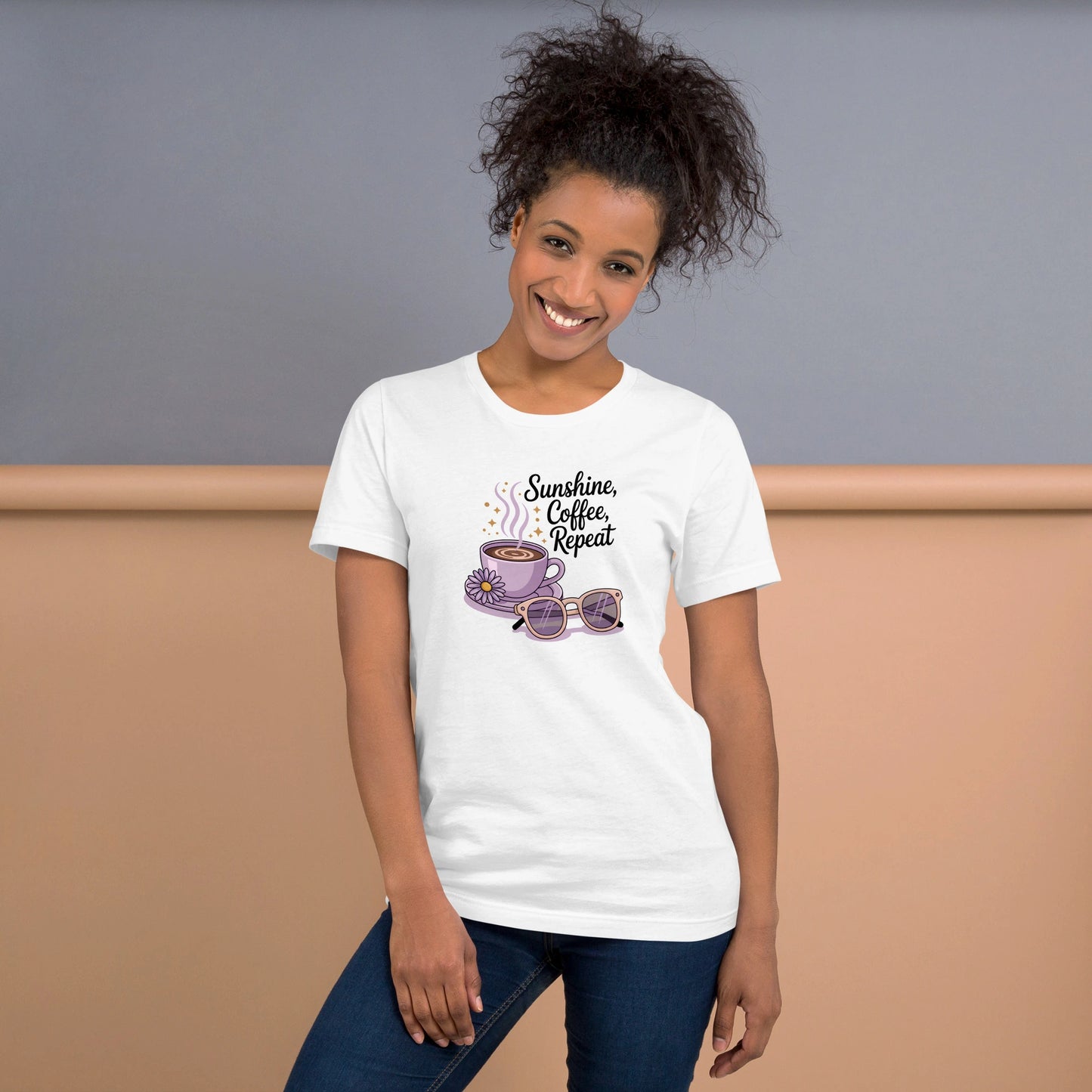 Smiling woman wearing a white summer t-shirt with cute coffee cup, daisy flower, sunglasses and "Sunshine, Coffee, Repeat" quote.