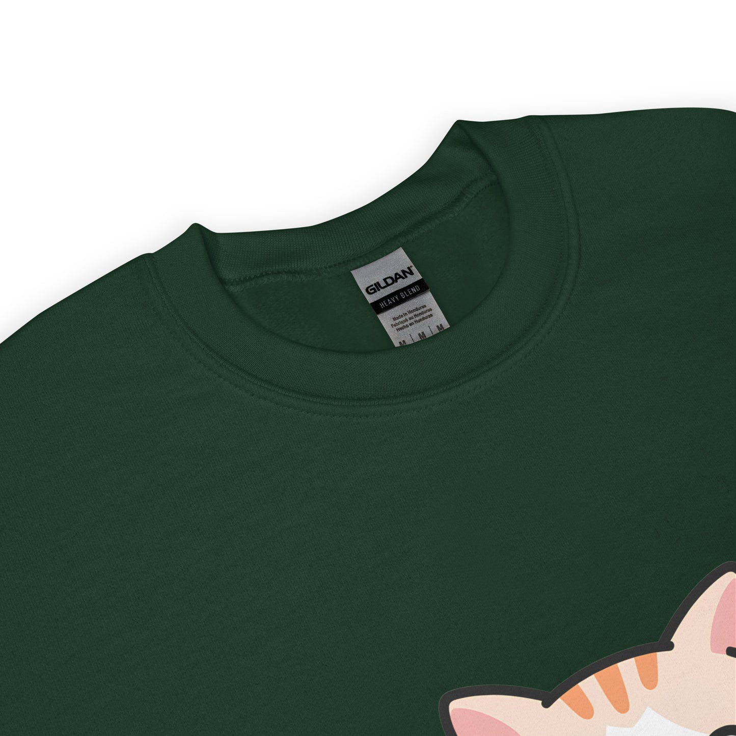 Close-up of forest green crewneck sweatshirt collar with a partial view of a printed cartoon cat ear.