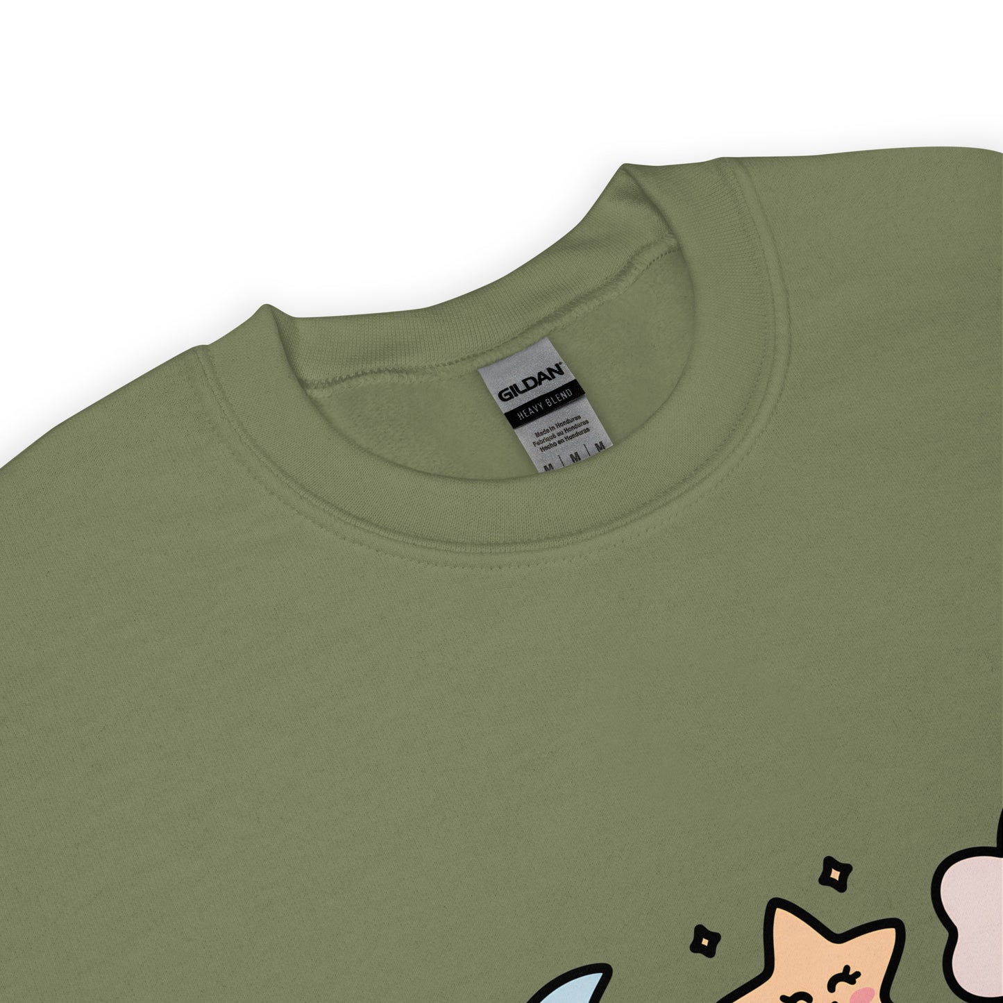 Close-up of the collar and tag of a military green Gildan crew neck sweatshirt, with a partial view of a colorful star and cloud design at the bottom edge.