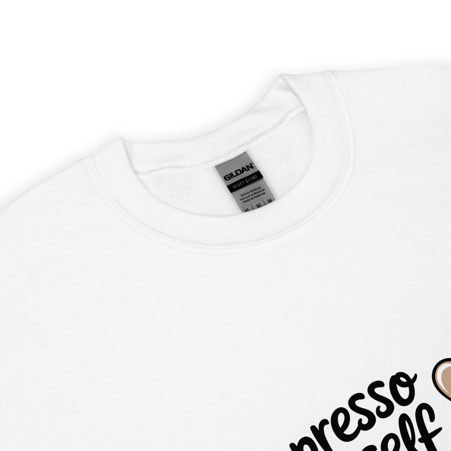 Close-up of a white crewneck sweatshirt with the phrase “Espresso Yourself” printed in black cursive font and a small coffee cup illustration on the side.
