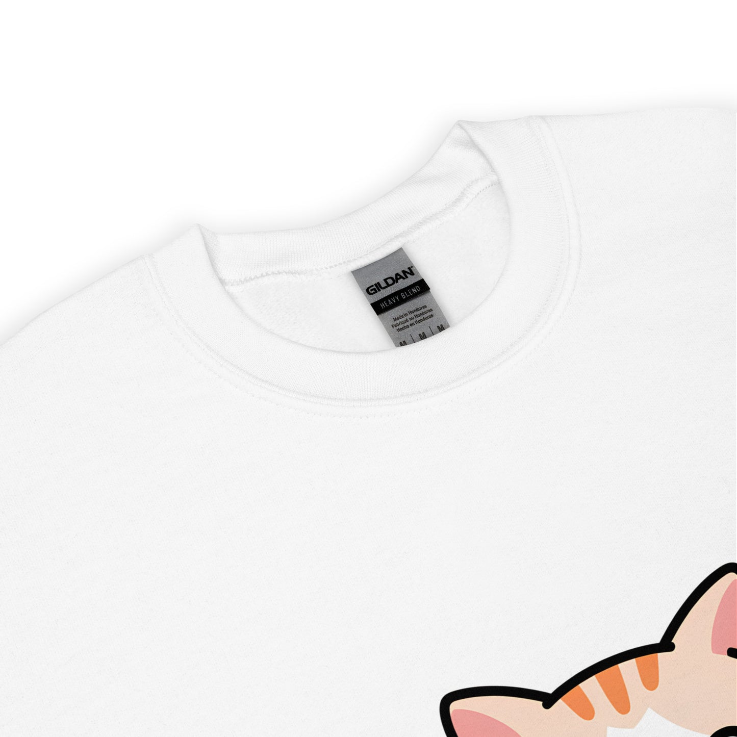 Close-up of white crewneck sweatshirt collar with a partial view of a printed cartoon cat ear.