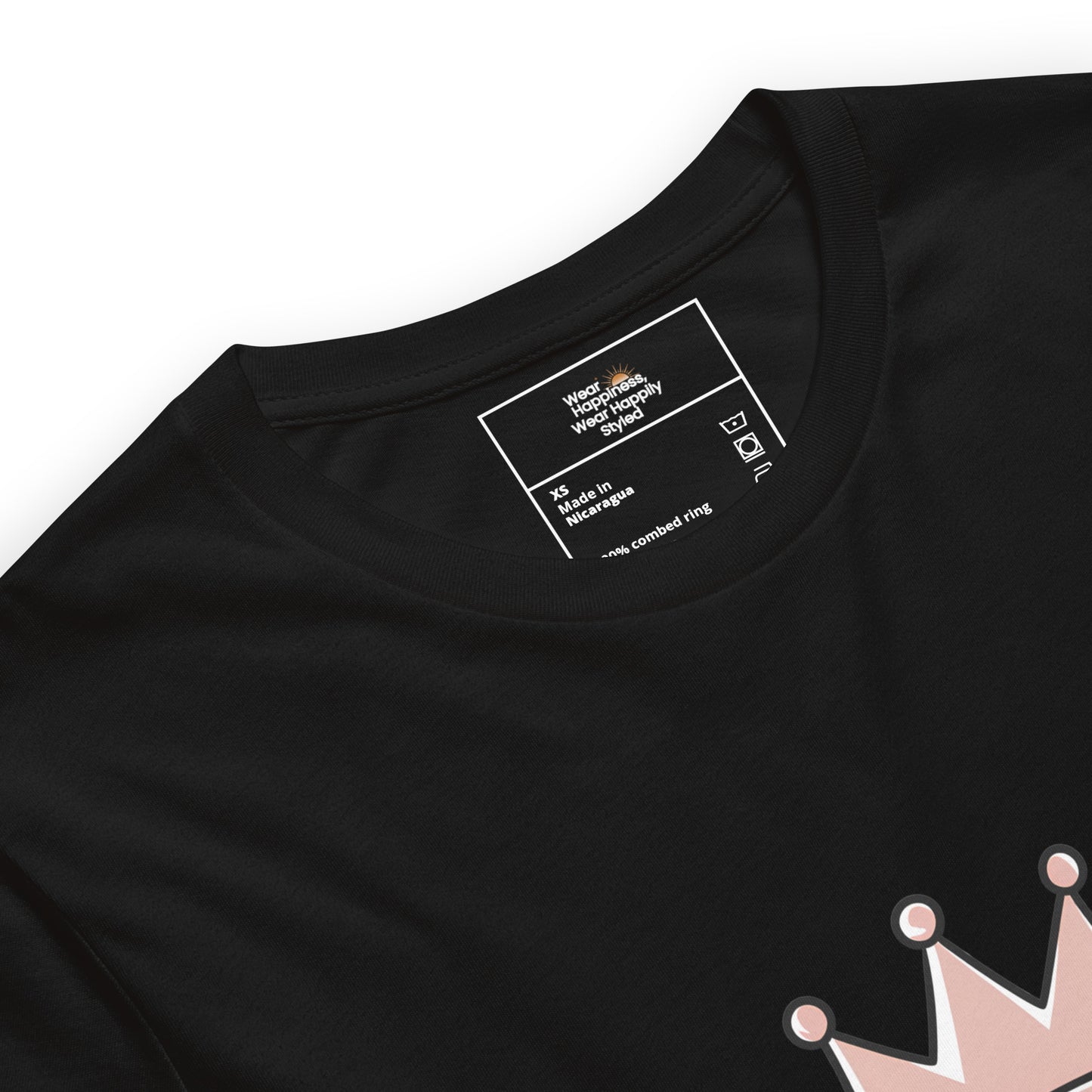 Close-up of a black unisex t-shirt showing printed inner label and partial “Caffeine Queen” crown design