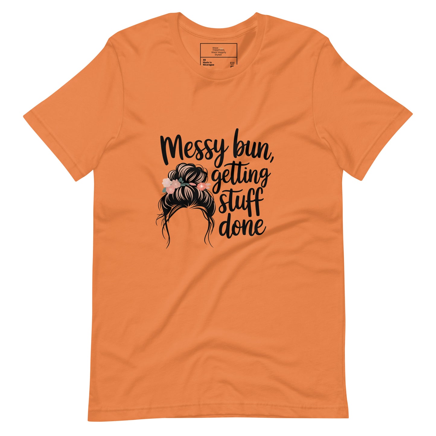 Orange t-shirt with black text that says 'Messy Bun, Getting Stuff Done' and a messy bun illustration on a white background