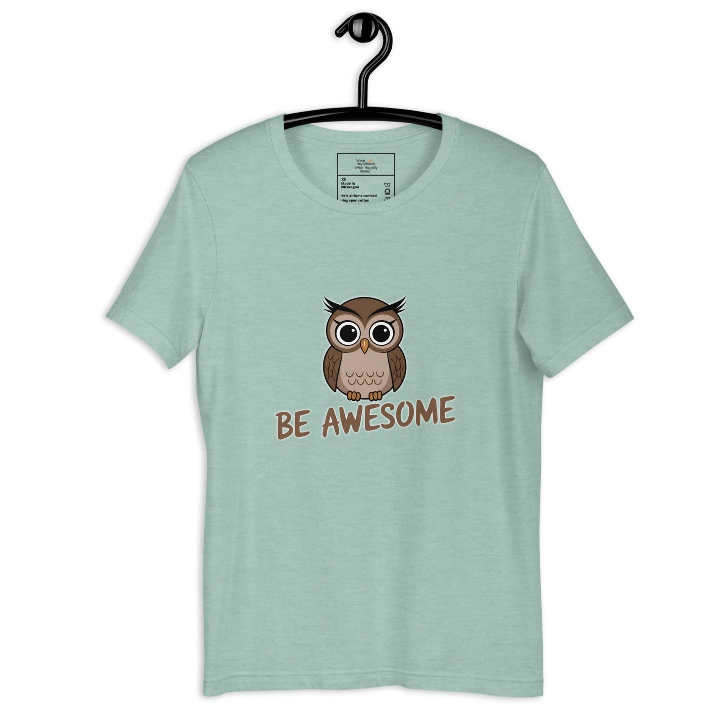 Dusty blue unisex t-shirt on hanger featuring a cute cartoon owl and the text “Be Awesome”