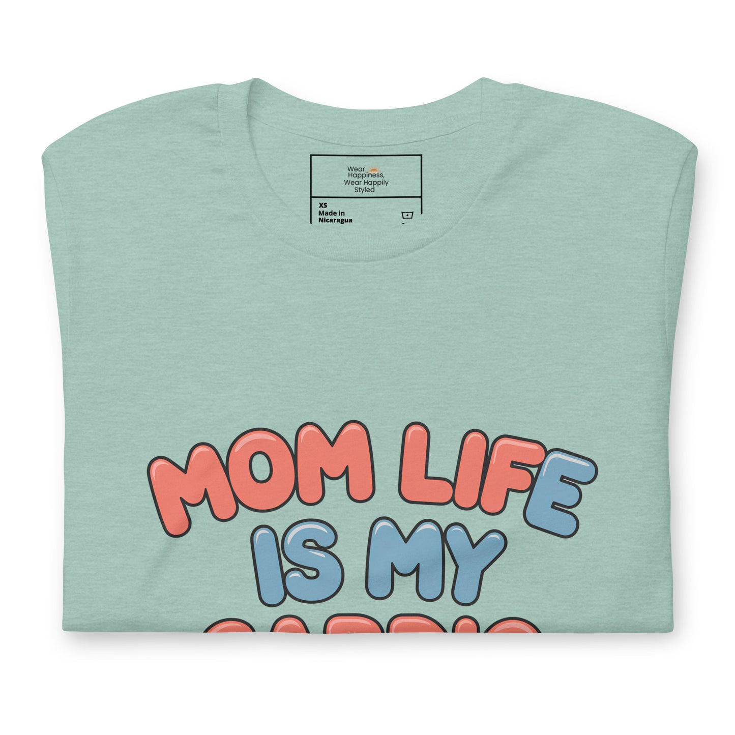 Dusty blue t-shirt neatly folded with a colorful design that reads 'Mom Life Is My Cardio' in pink and blue letters, partially visible across the chest area.
