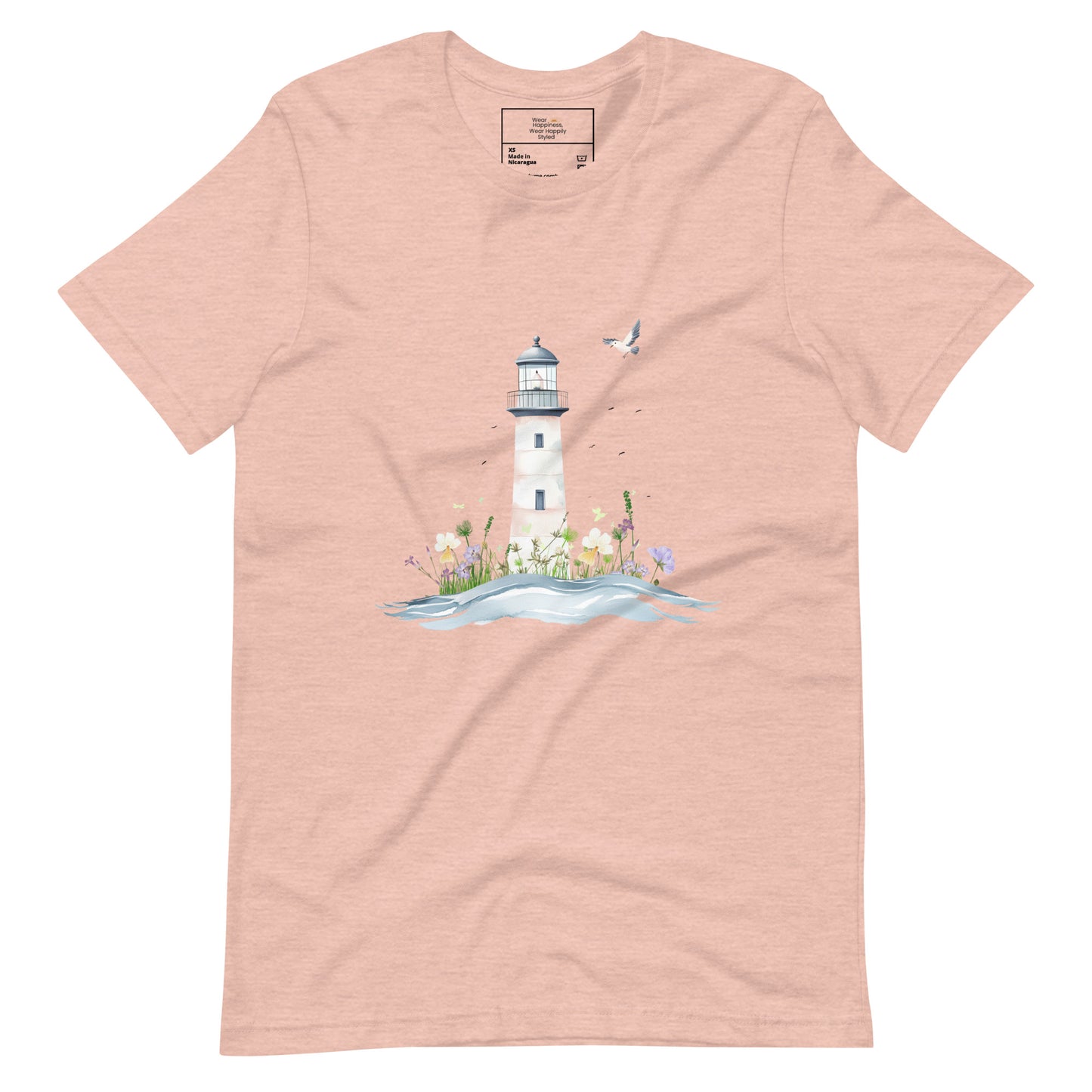 Peach-colored t-shirt laid flat featuring a serene lighthouse illustration with floral details and a seagull in flight, designed for peaceful mom style.