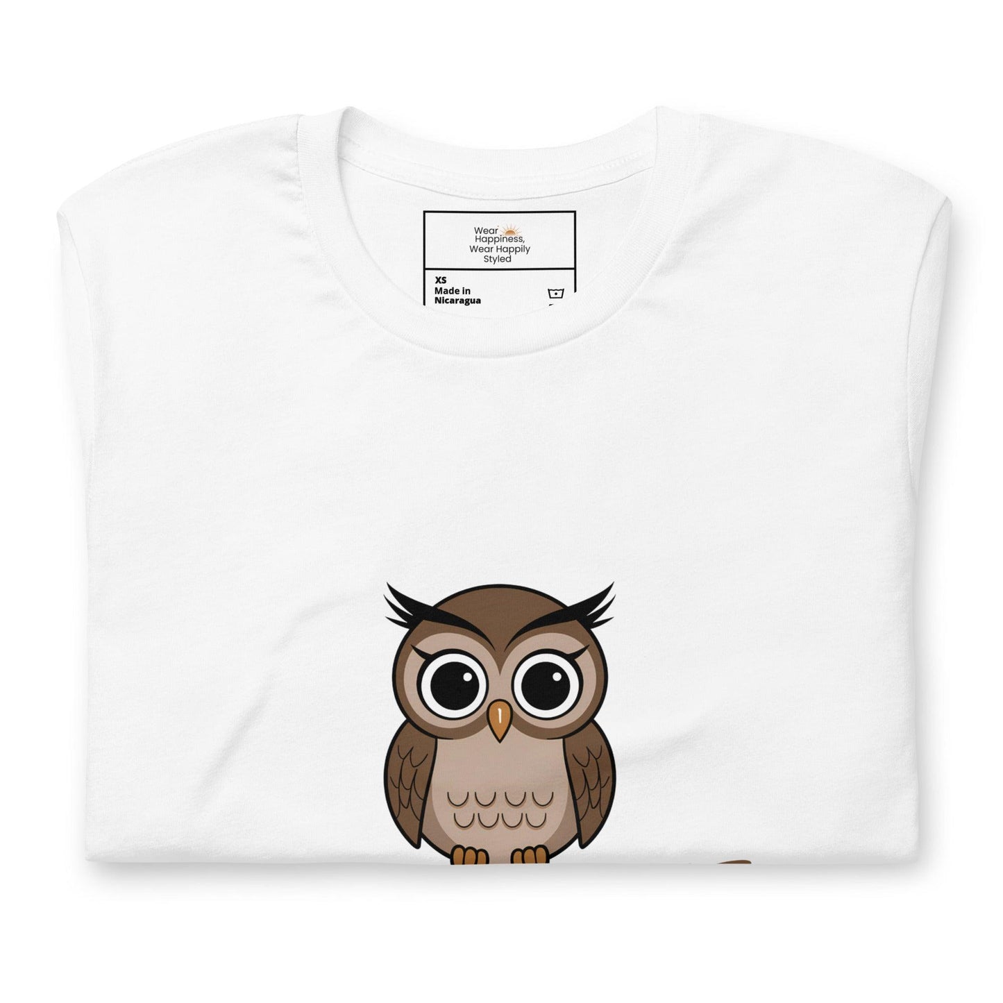 Close-up of a white t-shirt with a cute cartoon owl graphic peeking from the bottom