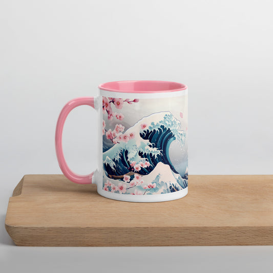 Pink-handled ceramic mug with cherry blossom and ocean wave design, placed on a wooden board with a clean white background.