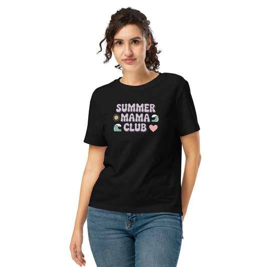 Woman wearing a black "Summer Mama Club" t-shirt with pastel design, standing in front of a white background.