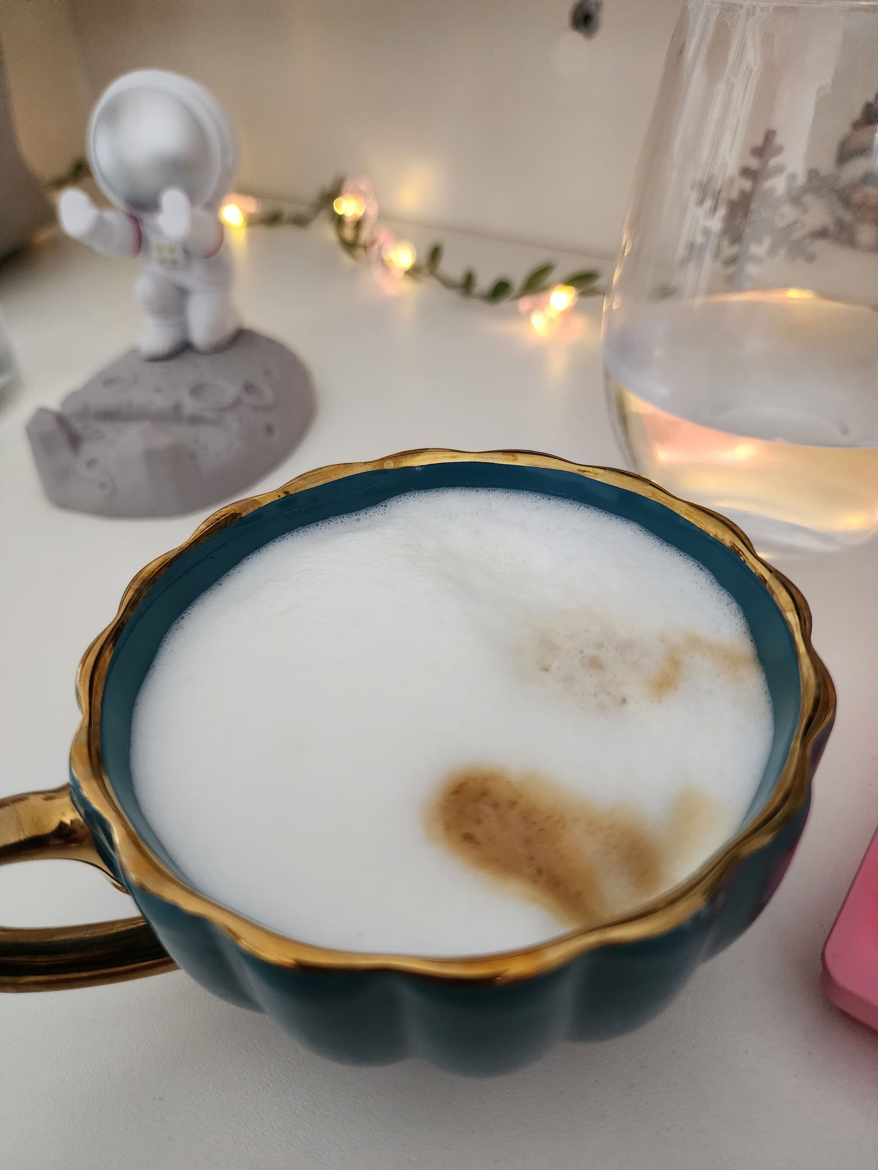 cozy scene with green cup of coffe 