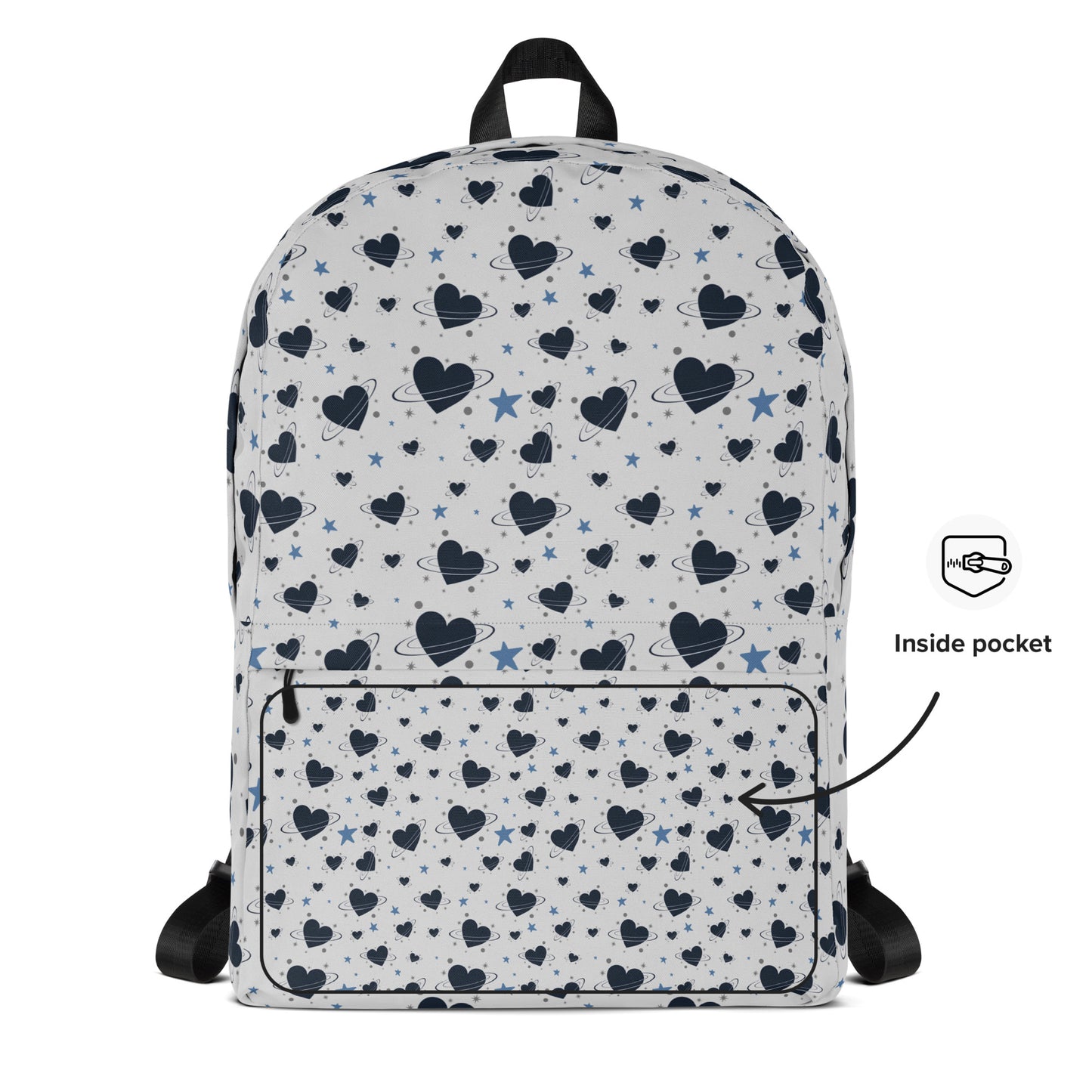 White backpack with all-over navy heart and star pattern, front pocket and visible inside pocket label 