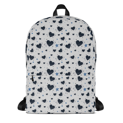 White backpack with all-over navy heart and star pattern, front pocket and visible inside pocket label 