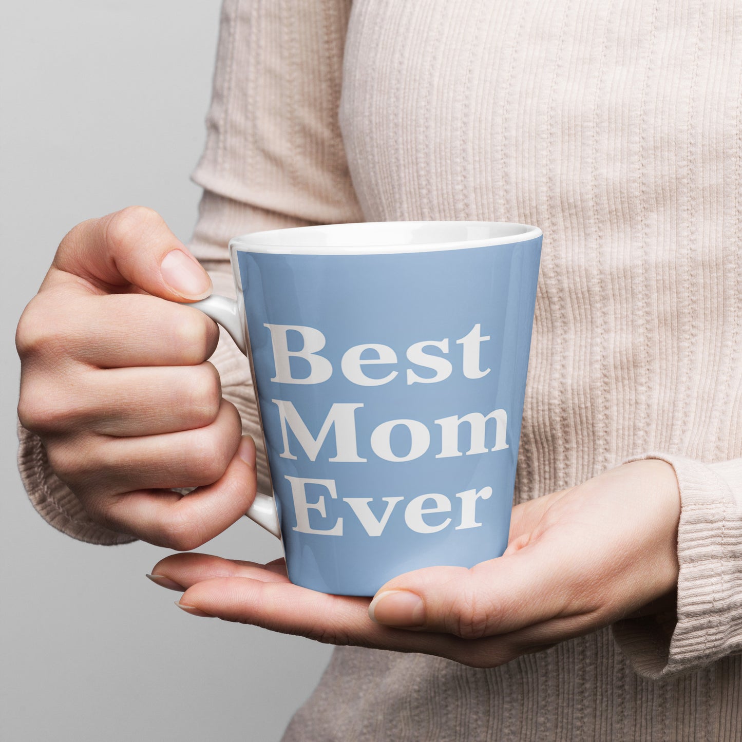 Woman holding blue Best Mom Ever latte mug – perfect cozy coffee cup gift for moms