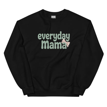 Flat lay of black Everyday Mama sweatshirt with green bubble lettering and pink bow.