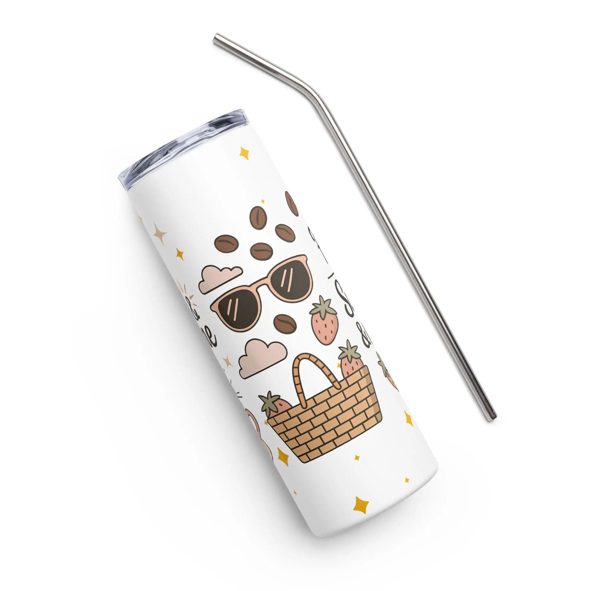 Close-up of white stainless steel tumbler with pastel picnic-themed illustrations including sunglasses, coffee beans, and strawberries. Includes metal straw.