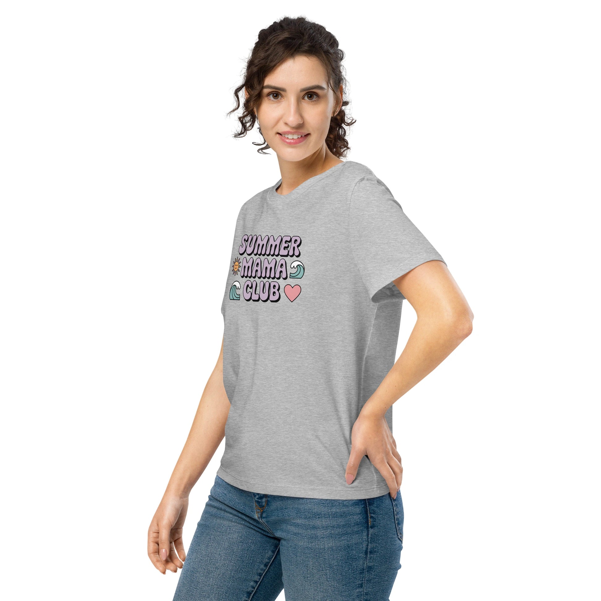 Woman modeling a heather grey “Summer Mama Club” t-shirt with cute wave, sun, and heart graphics in a playful summer vibe.