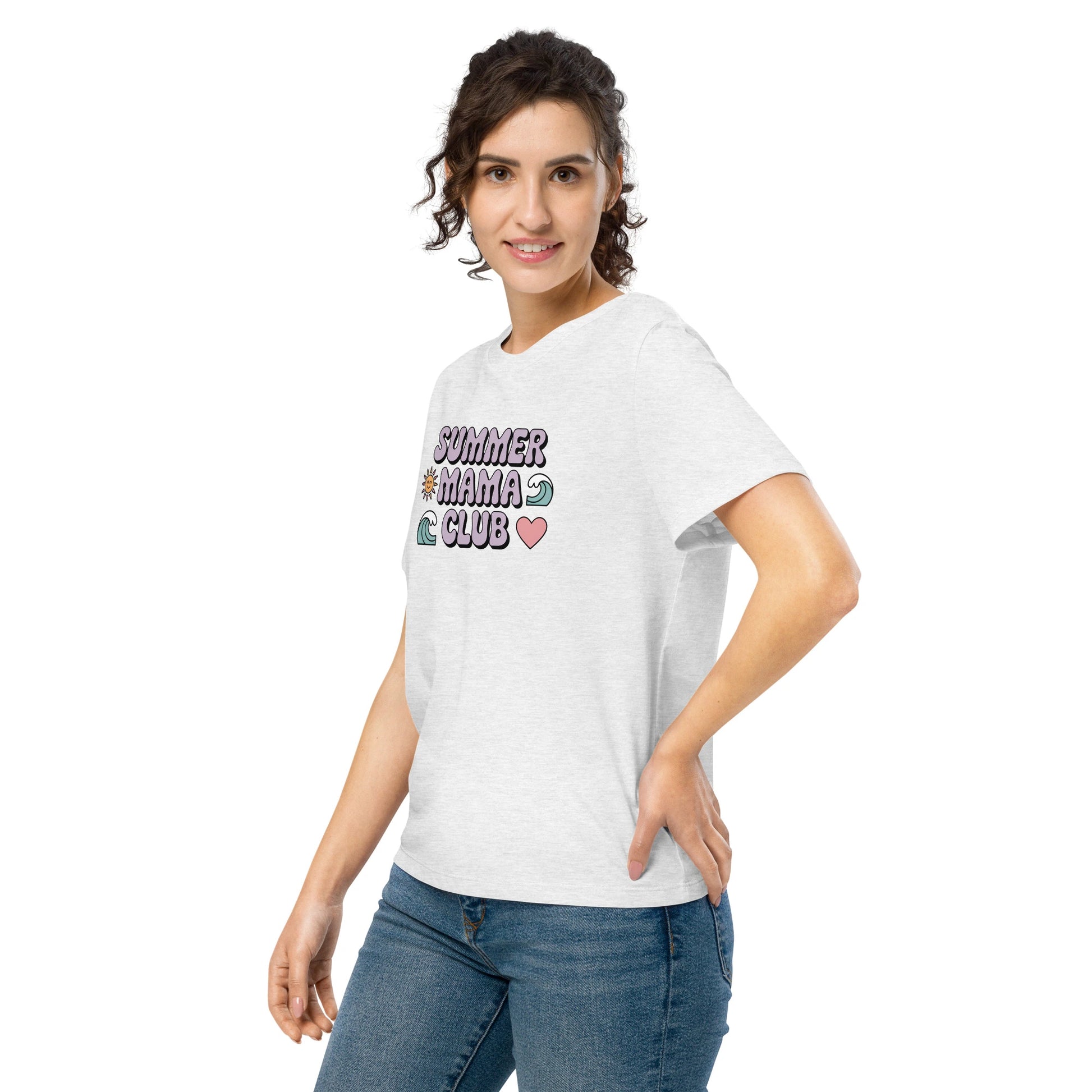 Woman modeling a light grey “Summer Mama Club” t-shirt with cute wave, sun, and heart graphics in a playful summer vibe.