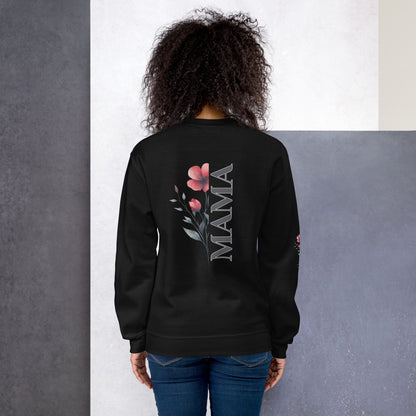 Woman wearing black sweatshirt with vertical 'MAMA' floral design on the back.