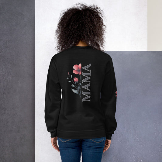 Woman wearing black sweatshirt with vertical 'MAMA' floral design on the back.