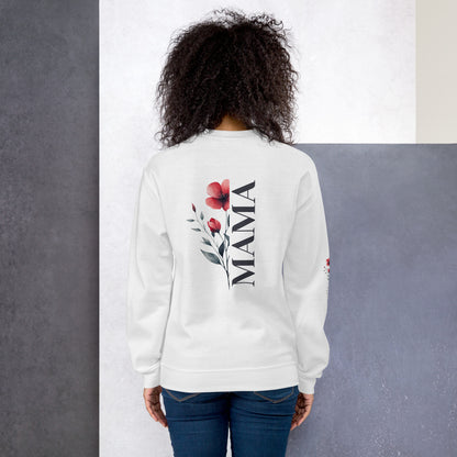 Smiling woman wearing white sweatshirt with floral design detail on the sleeve - back view