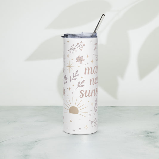 Front view of stainless steel summer tumbler with pastel floral design and “Mama Needs Sunshine” quote on white background