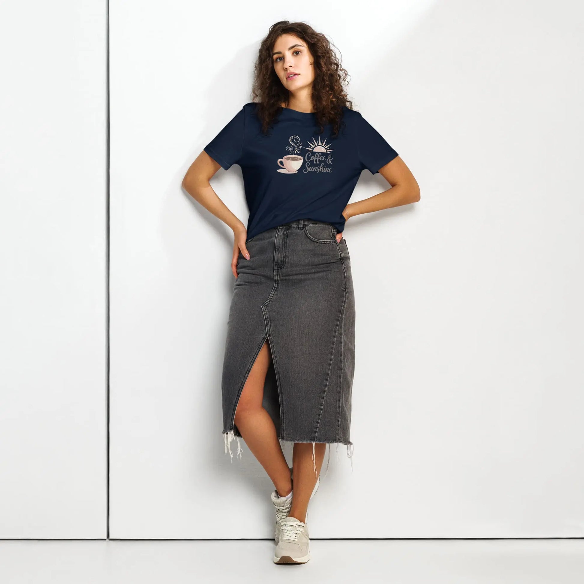 Woman modeling navy blue organic t-shirt with coffee and sunshine graphic. Casual outfit for moms.