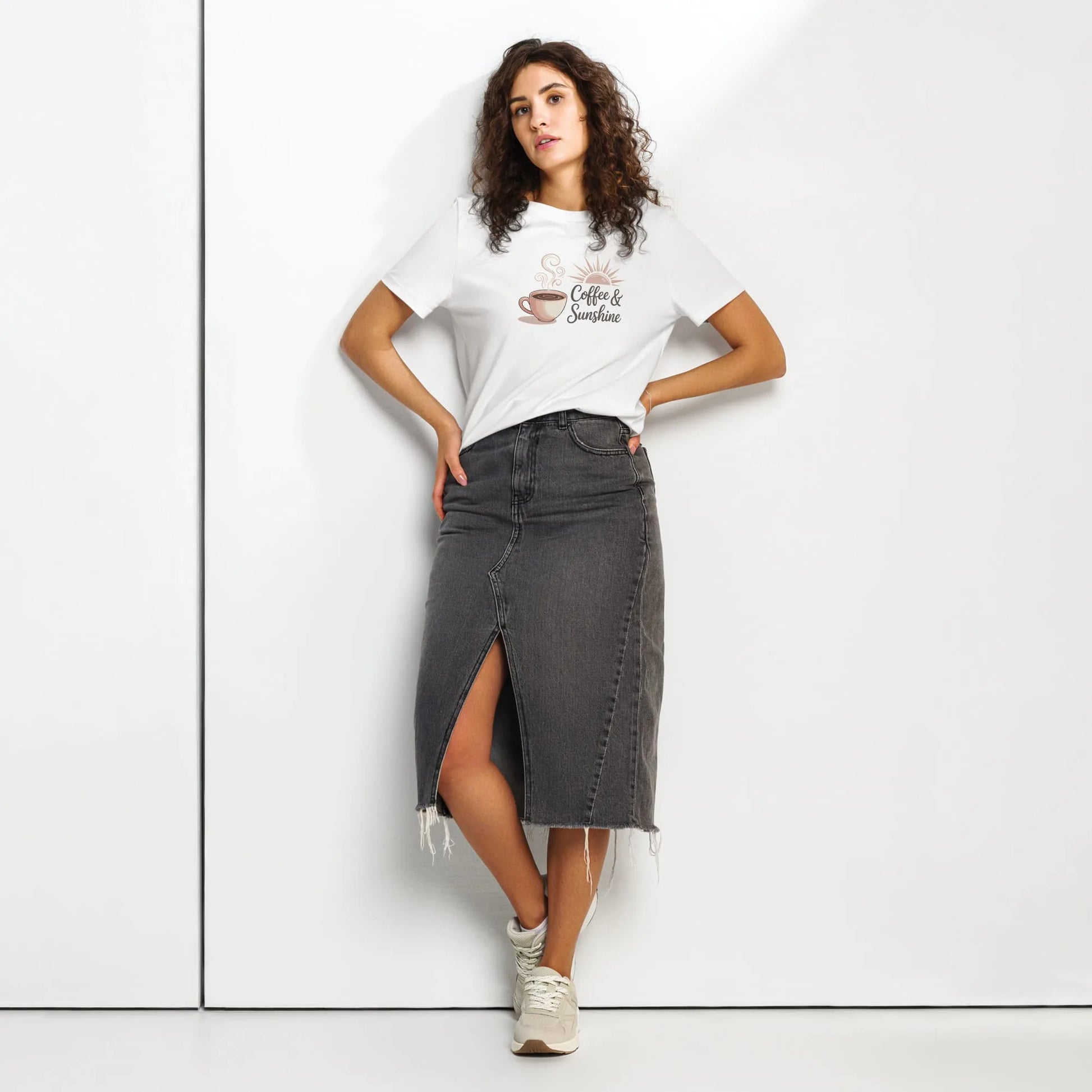 Woman modeling white mom shirt with “Coffee & Sunshine” design. 