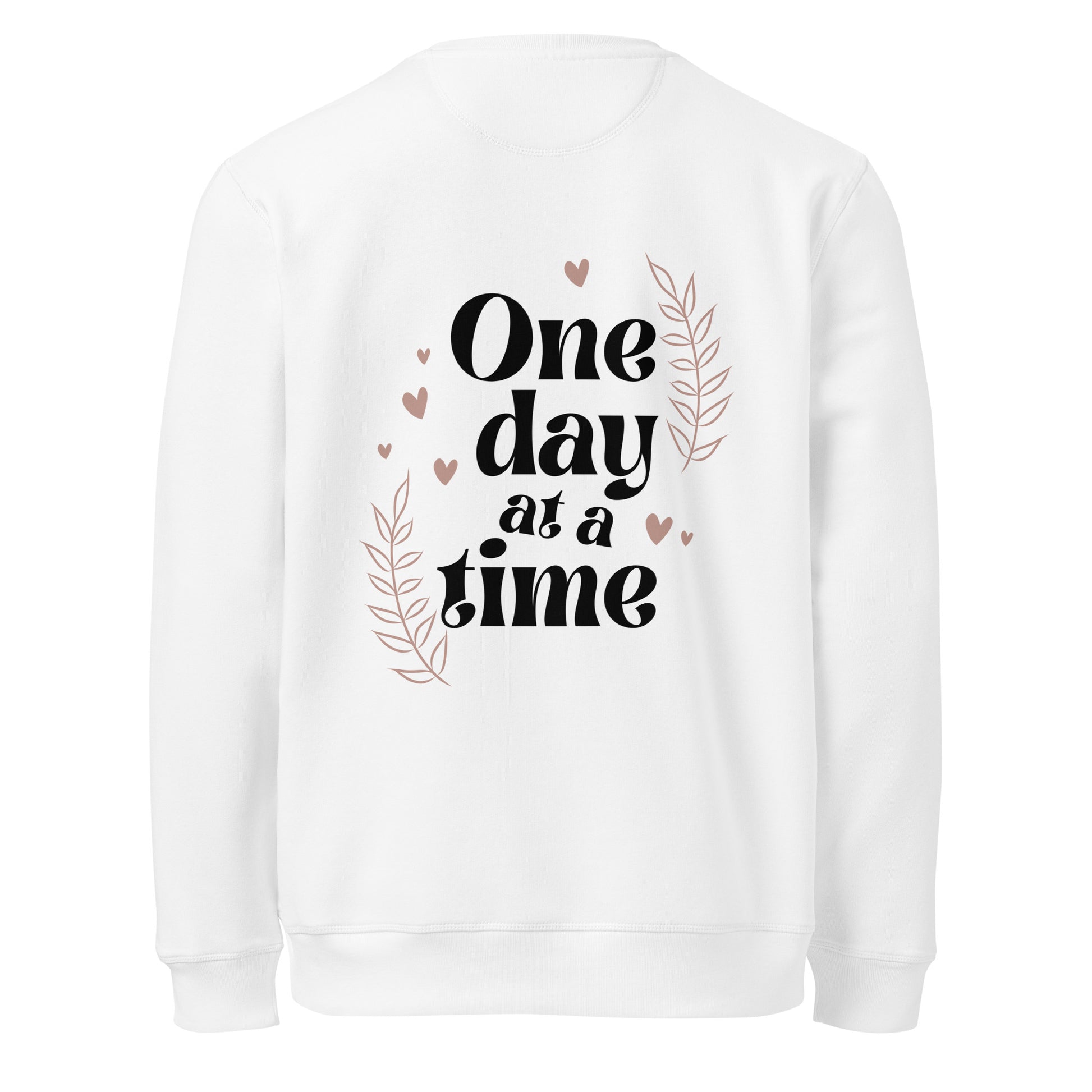  White unisex sweatshirt with 'One day at a time' quote and floral heart decorations on the back.