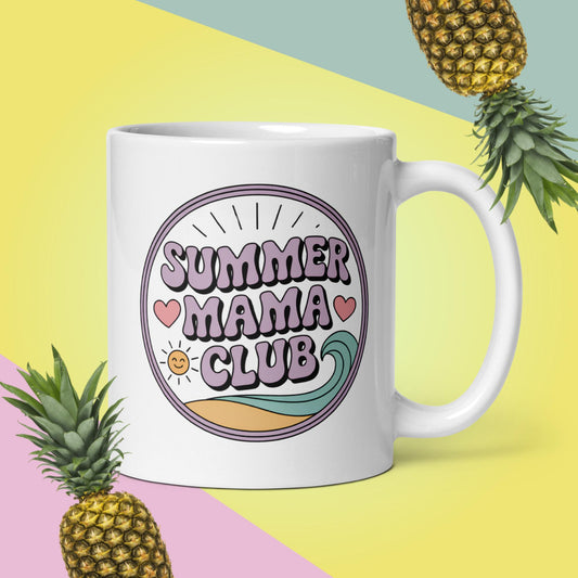 White 11oz ceramic mug with Summer Mama Club design, surrounded by pineapples on pastel beachy background