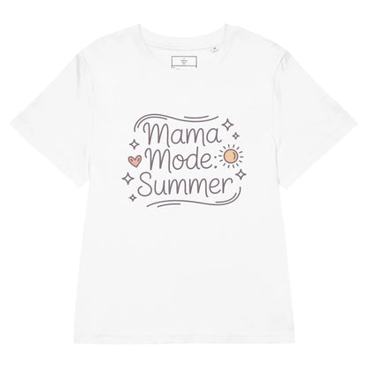 Flat lay of a white t-shirt with 'Mama Mode: Summer' design in pastel colors.
