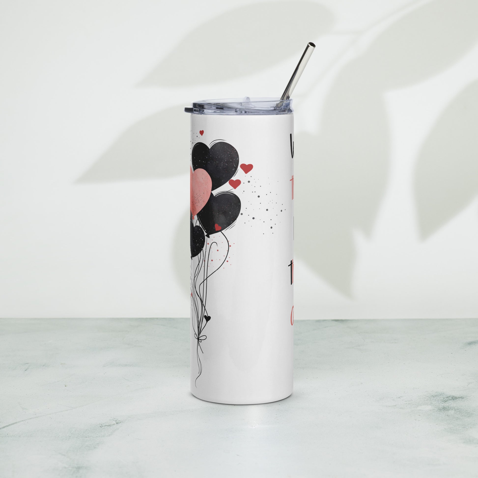 Back of the tumbler featuring black and red hearts with starry effect – matching the front quote design