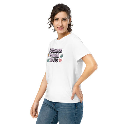 Woman modeling a white “Summer Mama Club” t-shirt with cute wave, sun, and heart graphics in a playful summer vibe.