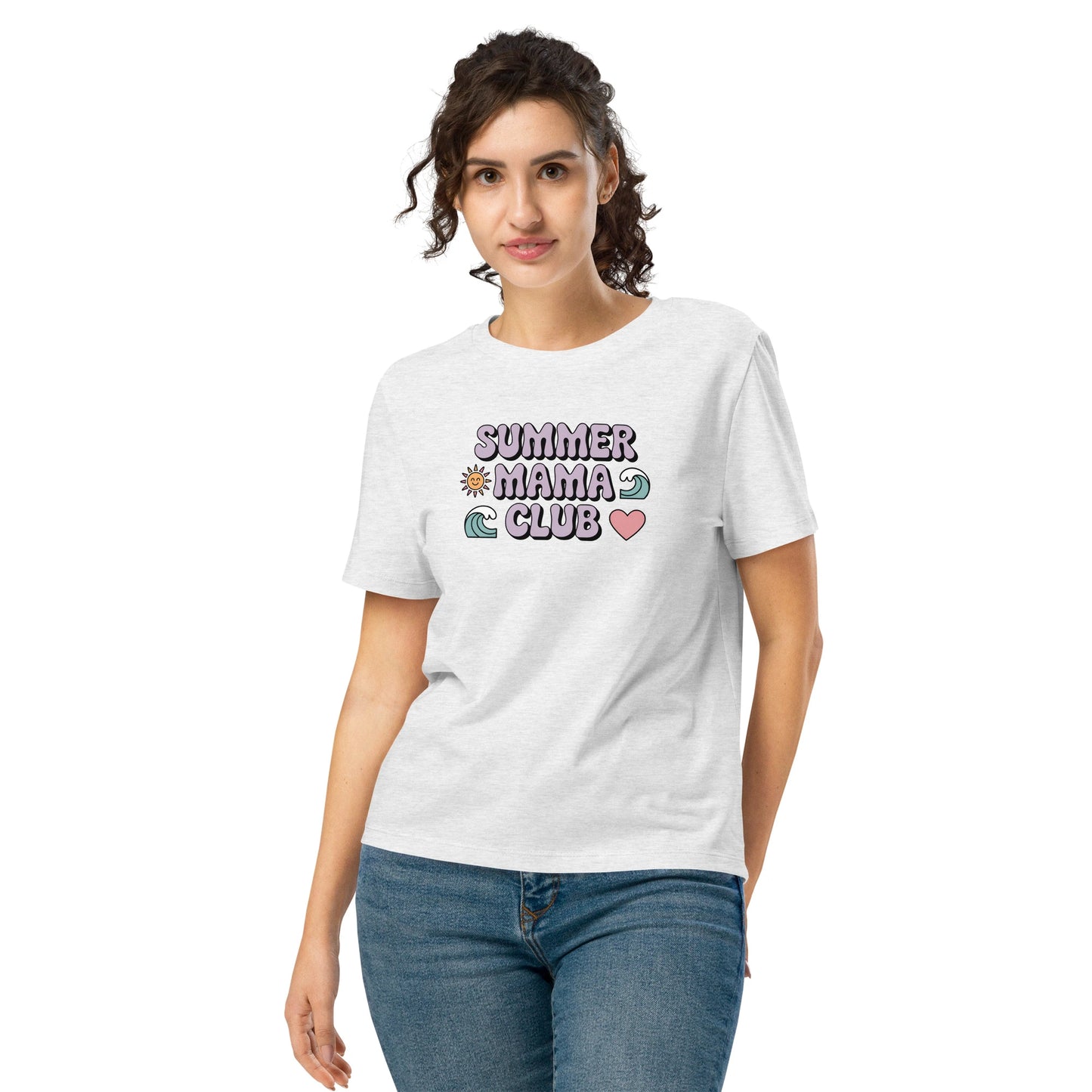 Woman wearing a light grey "Summer Mama Club" t-shirt with pastel design, standing in front of a white background.